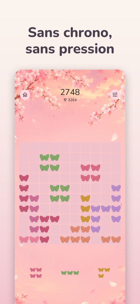 Le jeu avec le skin Sakura : tuiles papillon sur fond de cerisiers en fleurs